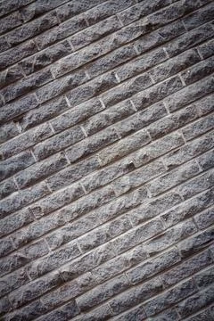 Old gray distressed brick wall Stock Photos