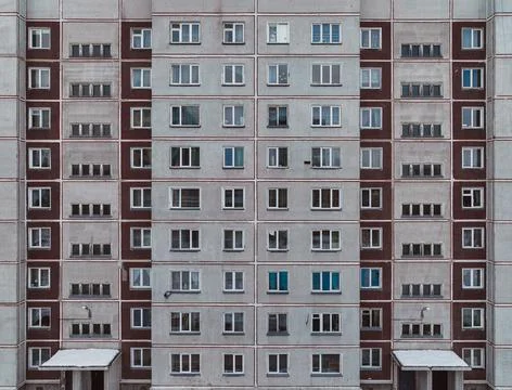 The old gray panel house. Texture and background Stock Photos