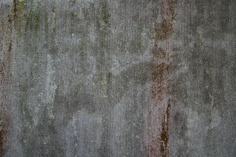Old gray slate, grunge texture, retro roof, with moss and cracks Stock Photos