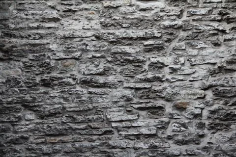Old gray stone wall background Stock-Fotos