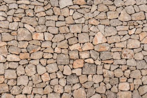 Old gray stone wall background texture Stock Photos