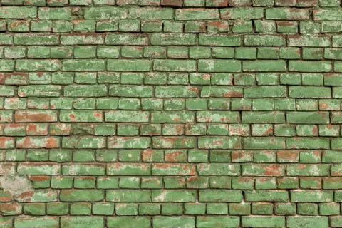Old green brick wall, rustic texture, design background. Stock Photos