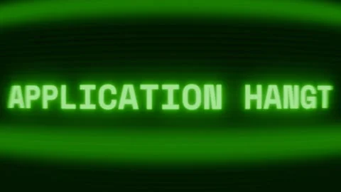 Old green CRT screen showing text APPLICATION HANG! appearing in random glitch 動画素材 318281012