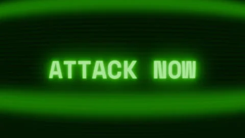 Old green CRT screen showing text ATTACK NOW appearing in random glitch and 動画素材 318281176