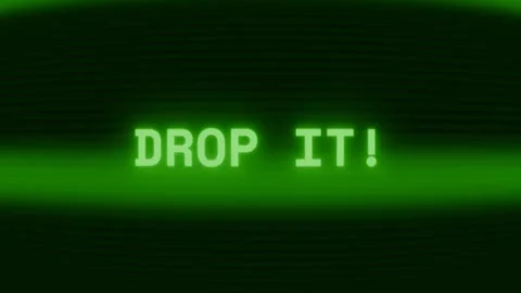 Old green CRT screen showing text DROP IT! appearing in random glitch and coding Stock Footage 318287375