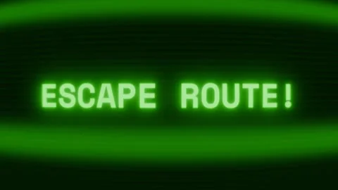 Old green CRT screen showing text ESCAPE ROUTE! appearing in random glitch and Video stock 318287932