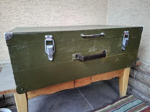 Old green wooden box with two handles Stock Photos