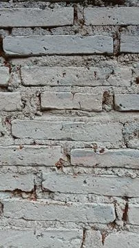 Old grey brick wall background texture, copy space Foto stock