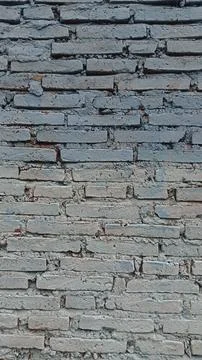 Old grey brick wall background texture, copy space Stock Photos
