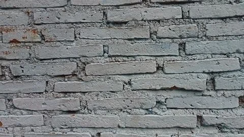 Old grey brick wall background texture, copy space Stock Photos