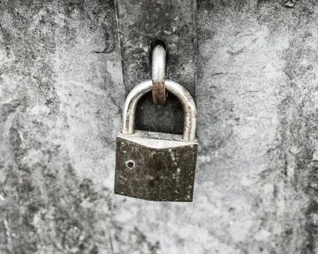 Old grey padlock Foto stock