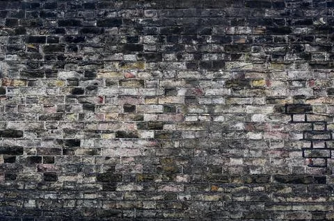 Old grey Victorian brick wall for use as a background texture Foto stock