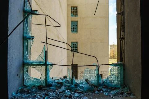 Old grid windows with broken glass Stock Photos