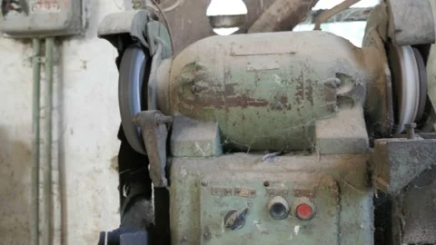 The old grinding-polishing machine in the workshop Stock Footage 89025585