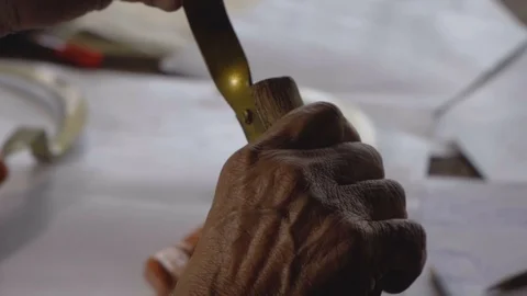 Old grumpy hands checking at his tool Stock Footage 119260244