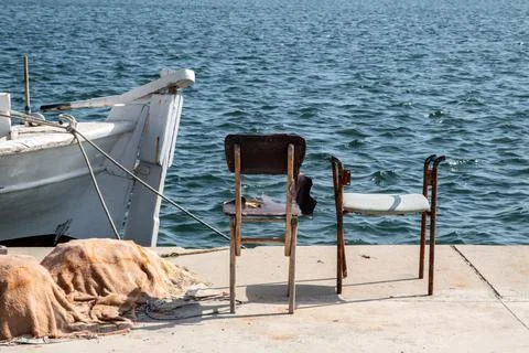 Old grunge battered chairs Stock Photos