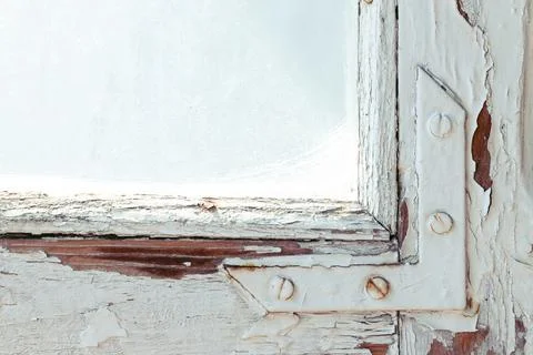 Old grunge decayed window frame work elements of wood and metallic screws wit 写真素材