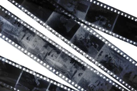 Old grunge negative films isolated Stock Photos