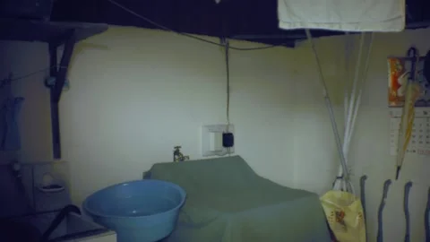 Old grunge simple interior view of an attic laundry room in ghetto style Stock Footage 204503043