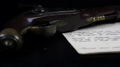 Old gun and old document, dolly Stock Footage 51317375
