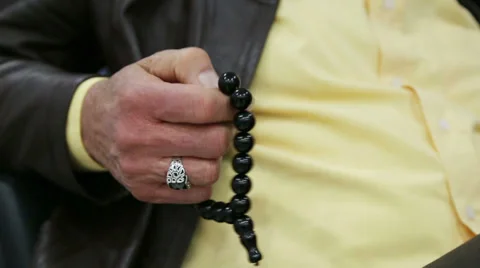 Old guy is playing beads 2 Stock Footage 37181191