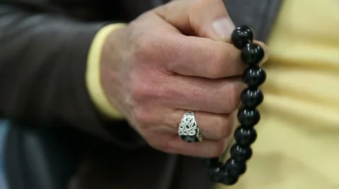 Old guy is playing beads close shoot Stock Footage 37178771