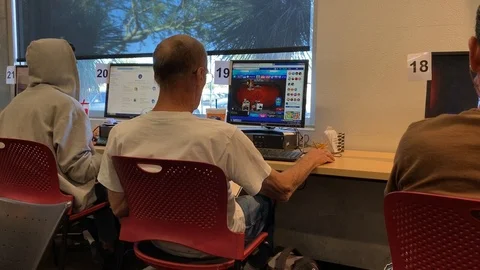 Old Guy Playing Computer Card Game  IMG 5131 Stock Footage 119542661