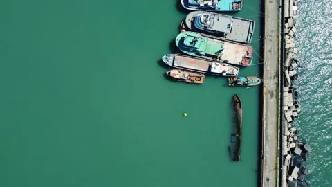 Old half-sunken ship in port Stock Footage 168620442