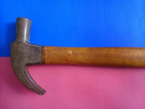Old hammer with a colored background Stock Photos