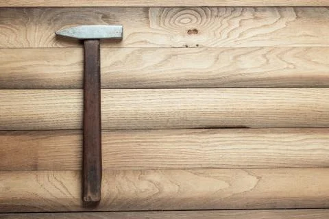 Old hammer on the table Stock Photos