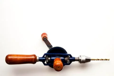 Old Hand Drill lying on work surface Stock Photos