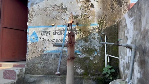 Old hand pump Stock Footage 322934544