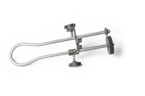 Old hand tile cutter for small repair on the white background Stock Photos