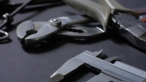 Old hand tools. The movement of the camera dolly. Camera closeup. Stock Footage 73462011