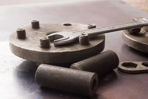 Old hand tools ,Pliers screwdriver wrench rusted iron metal tools on Steel pl Stock Photos