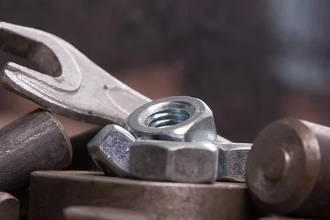 Old hand tools ,Pliers screwdriver wrench rusted iron metal tools on Steel pl Stock Photos