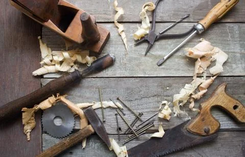 Old hand tools table upper view. Stock Photos