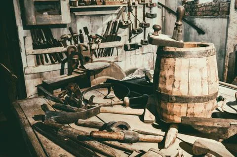 Old hand tools in vintage workshop Stock Photos