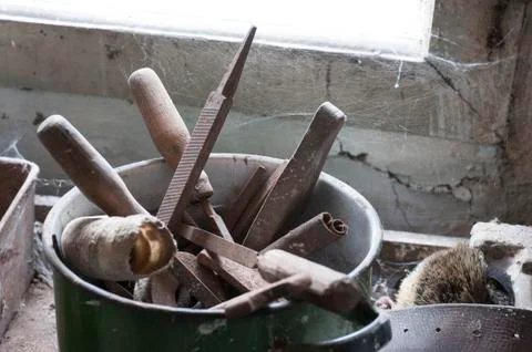 Old hand tools with web Stock Photos