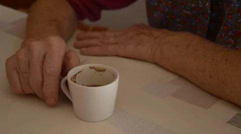 Old hands and coffe cup Stock Footage 43050751