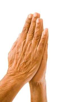 Old hands praying Stock Photos