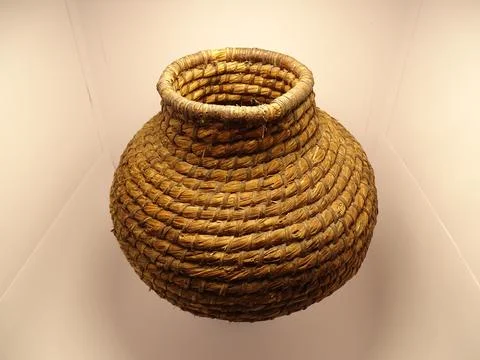 Old handwoven basket – worn, authentic folk utility item Fotos Stock