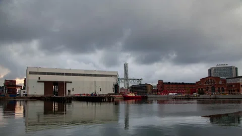 Old harbor warehouse in the center of Malmo, cityscape timelapse cloudscape Stock Footage 233659329