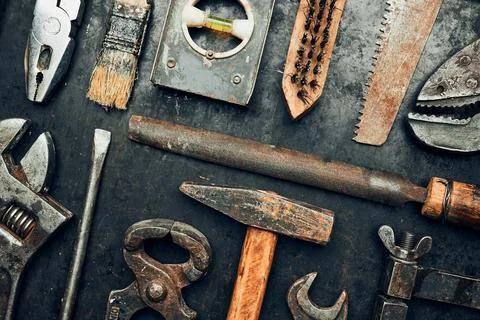 Old hardware tools. Wrench, screwdriver, measure, hammer, pliers on steel s.. Stock Photos