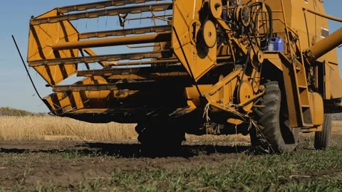 Old harvester working in the field. Stock Footage 95507521