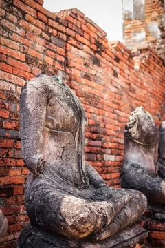 Old headless broken buddha statue at Ayutthaya Thailand Stock Photos