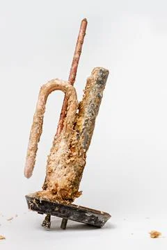 Old heating element for heating water in domestic water heaters and boilers o Stock Photos