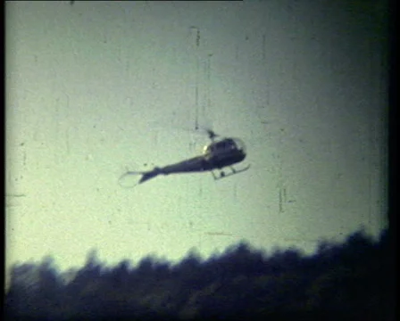 Old helicopter passing by Stock-Footage 29862857