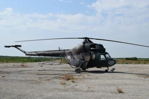 Old helicopter spraying fields Foto stock