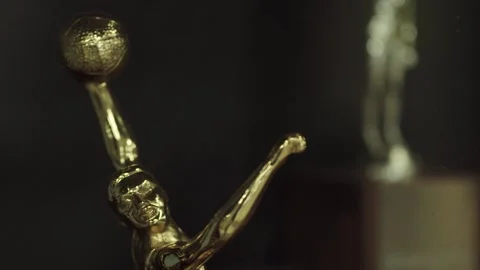 Old High School Basketball Trophy - Pan Left Video stock 253201498